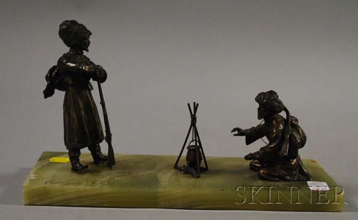 Appraisal: Russian-style Patinated Cast Metal Sculpture Depicting Cossacks at a Campfire