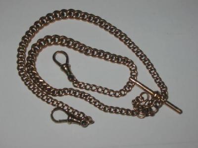 Appraisal: A CT GOLD DOUBLE ALBERT the graduated curb link hanging