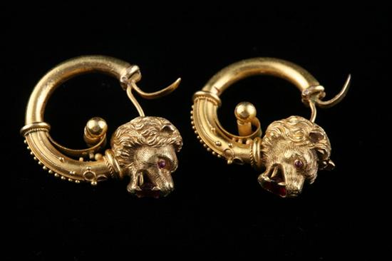 Appraisal: PAIR VICTORIAN K YELLOW GOLD AND GARNET LION'S HEAD EARRINGS