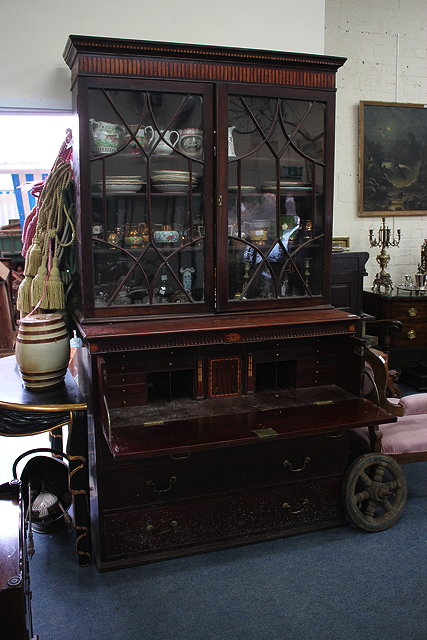 Appraisal: A GEORGE III MAHOGANY SECRETAIRE CHEST OF DRAWERS the upper