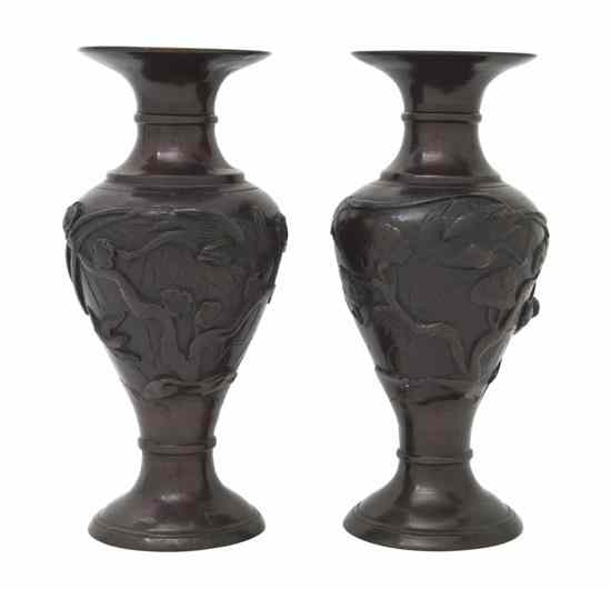 Appraisal: A Pair of Japanese Bronze Vases each having an everted