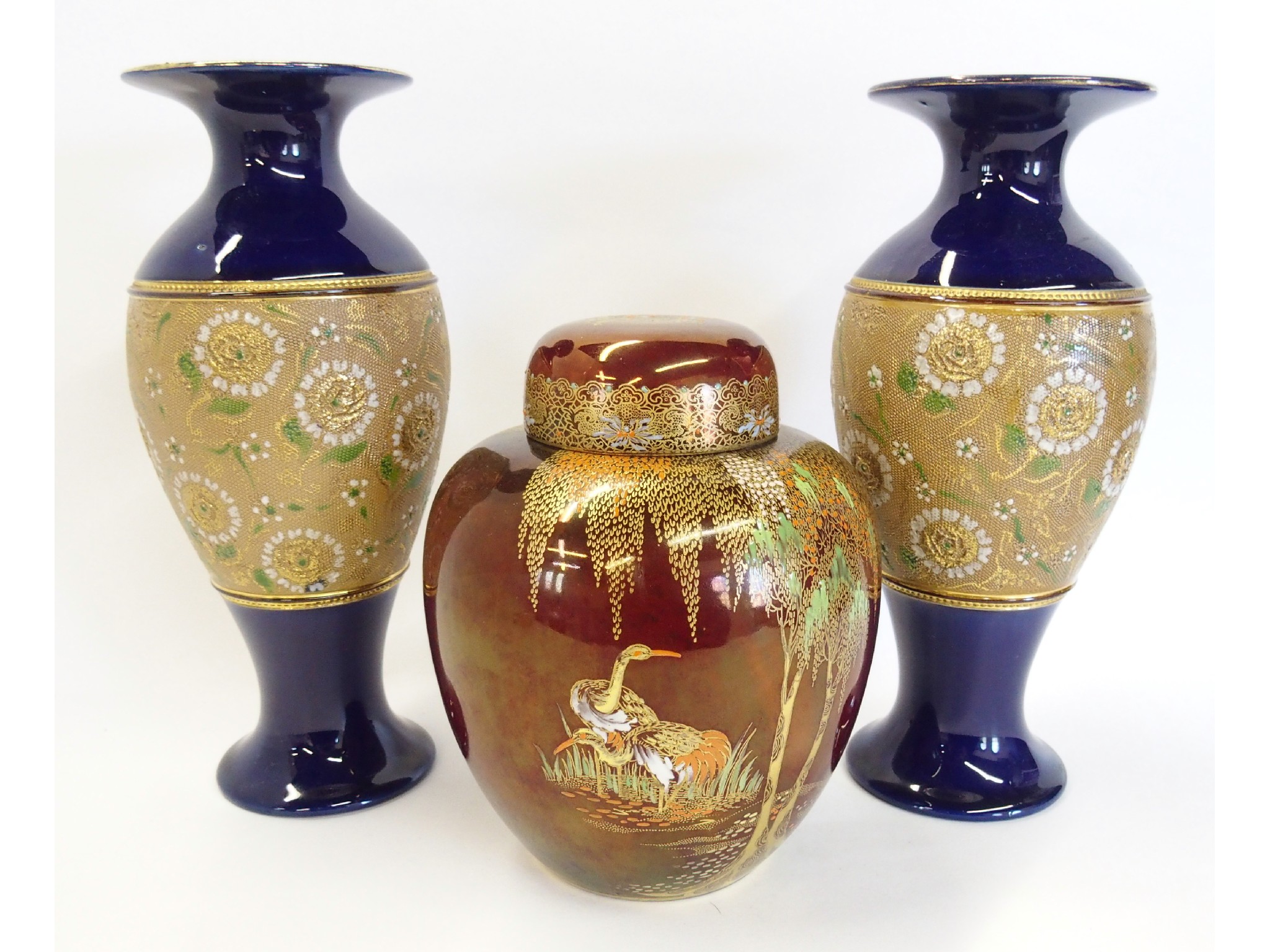 Appraisal: Pair of Doulton stoneware vases and a Carlton Ware Rouge