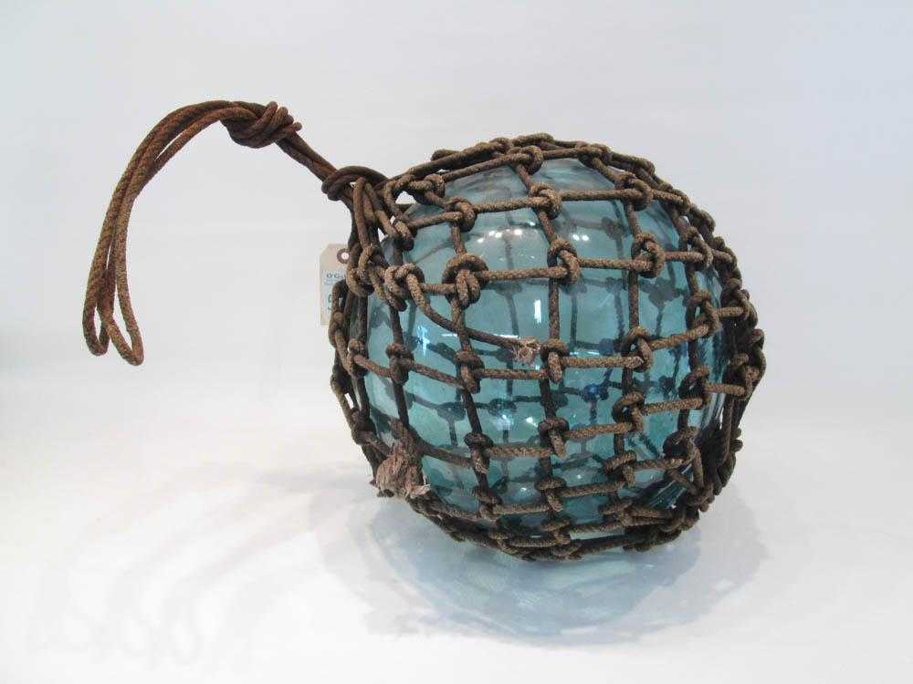 Appraisal: JAPANESE GLASS FISHING FLOAT having original netting diameter approximately inches