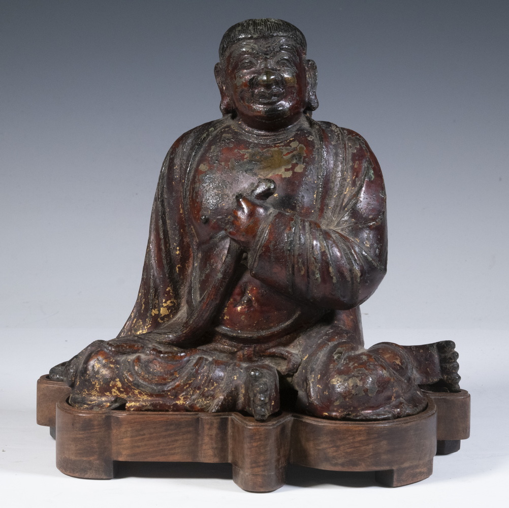 Appraisal: BUDDHIST STATUE OF GANDHARA Sand cast bronze in remnants of