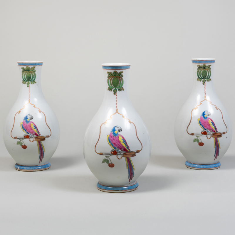 Appraisal: SET OF THREE CHINESE EXPORT PORCELAIN PERCHING PARROT VASES POSSIBLY