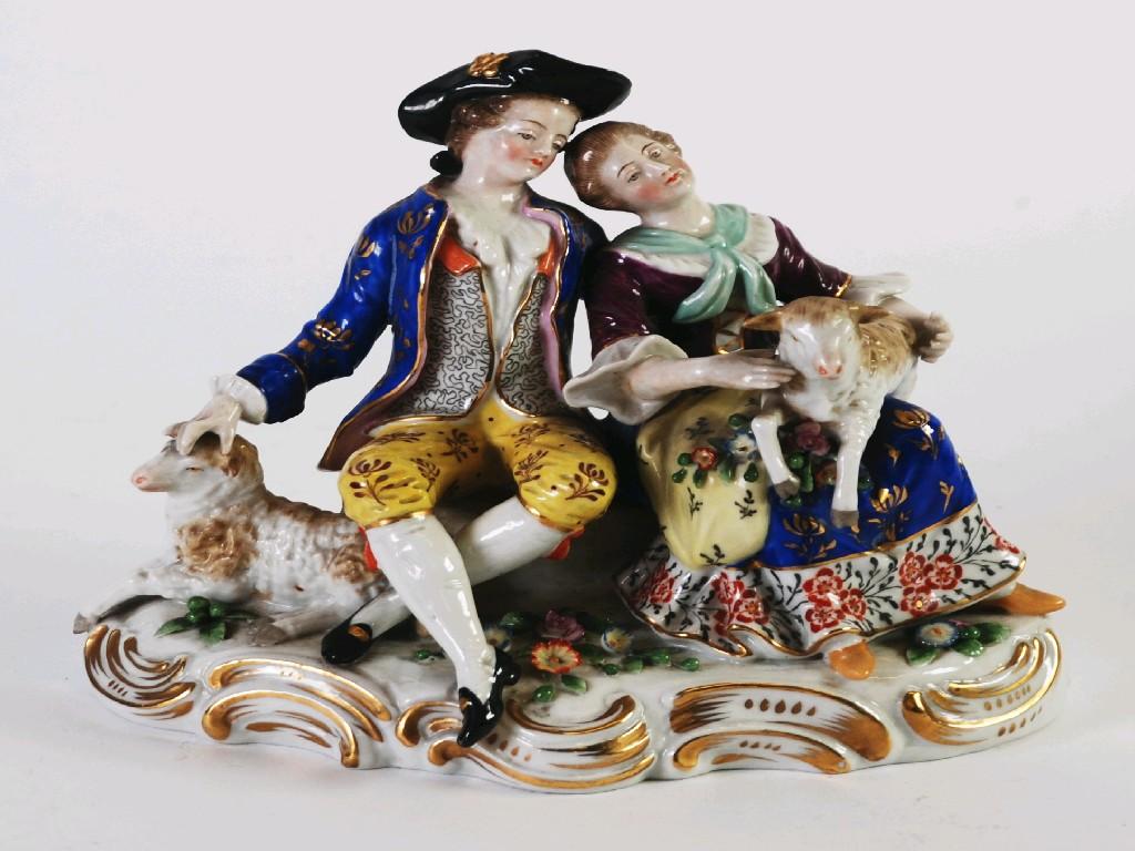 Appraisal: TWENTIETH CENTURY CONTINENTAL PORCELAIN GROUP modelled as a gallant and