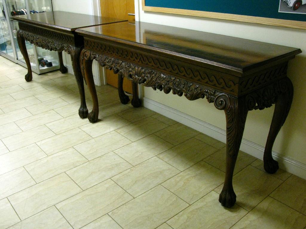 Appraisal: Pair of early Georgian style walnut Serving Tables with feather