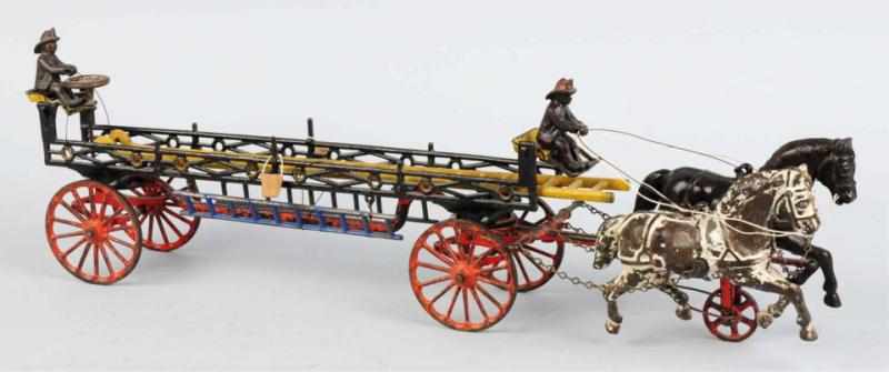 Appraisal: Cast Iron Phoenix Fire Ladder Horse-Drawn Wagon American Made by