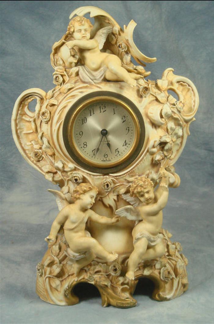 Appraisal: German porcelain case clock with cherub design Seth thomas movement