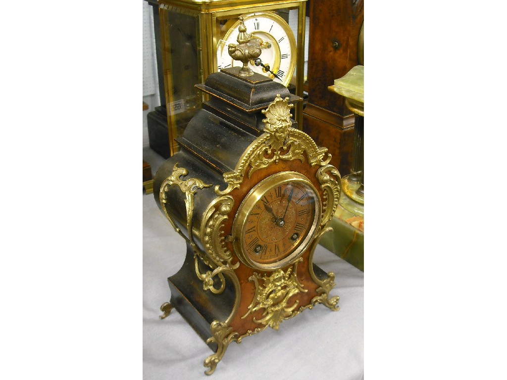 Appraisal: Walnut and ebonised eight day mantel clock the Lenzkirch movement