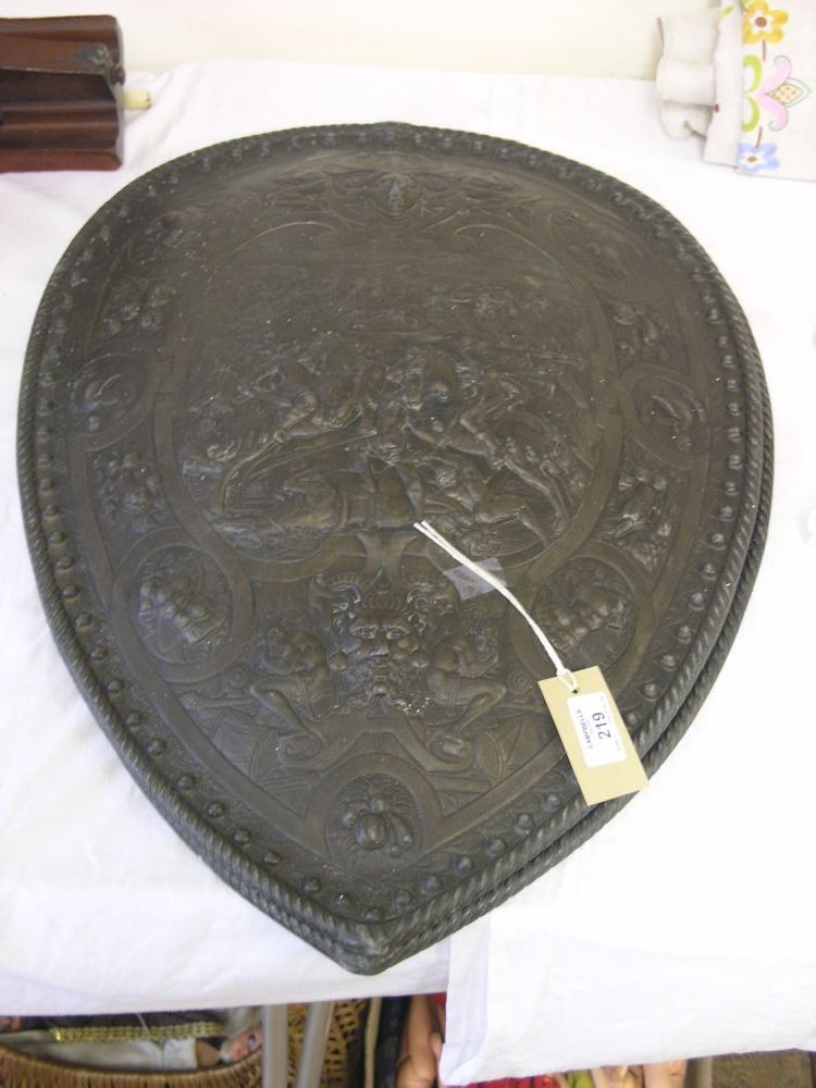 Appraisal: A pair of heavy cast metal shields cast with a