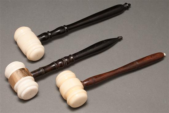 Appraisal: Three carved ivory gavels two with turned ebony handles the