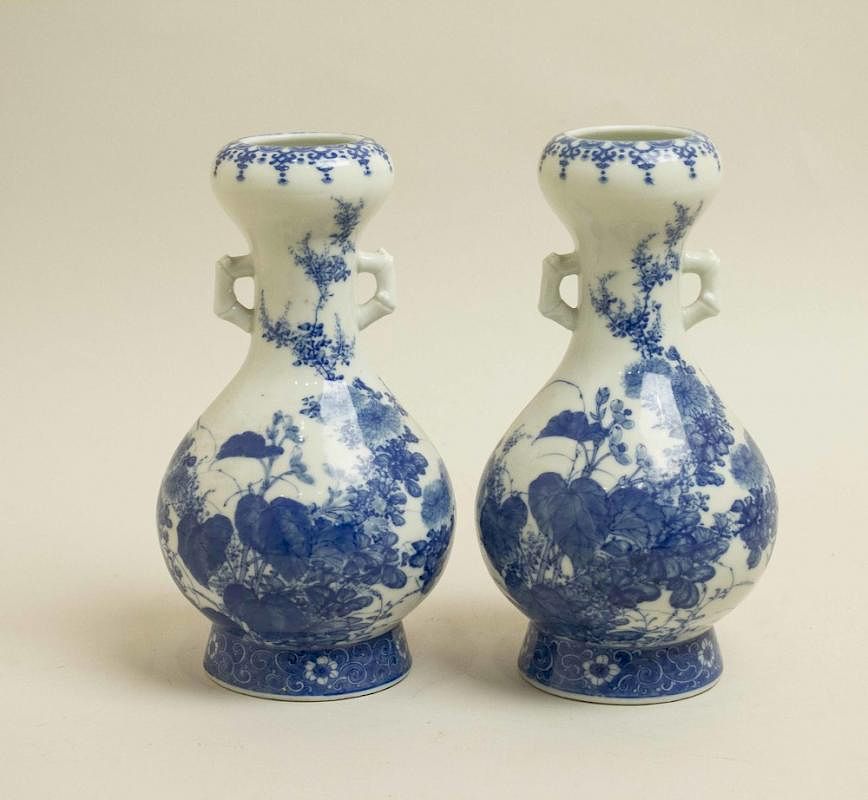 Appraisal: Two Japanese Ceramic Vases Two Japanese blue and white ceramic