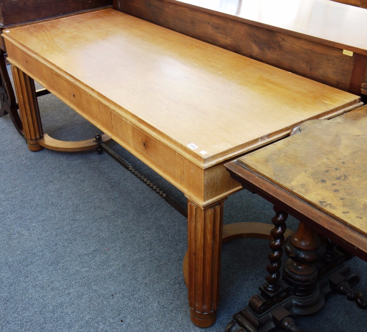 Appraisal: A mid- th century French three drawer writing desk on