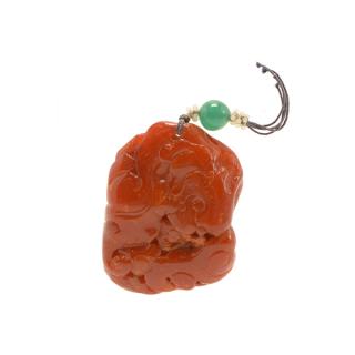 Appraisal: A Carved Amber Pendant th th Century cm A Carved