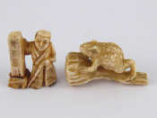 Appraisal: Two ivory netsuke circa one a toad on a flower