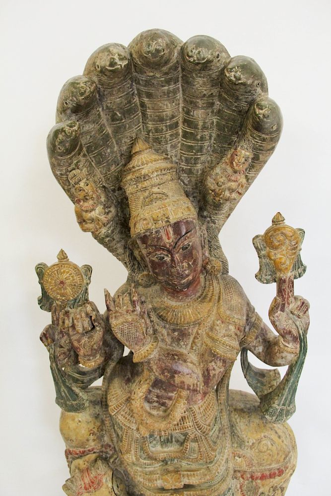 Appraisal: A Large Polychrome Wood Figure of Krishna Seated atop Nandi