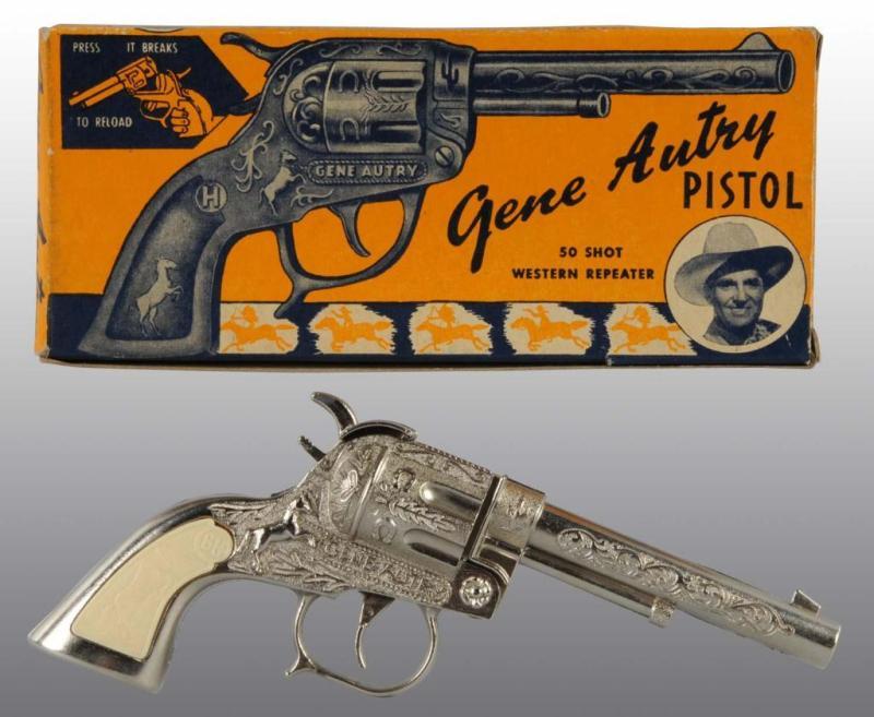 Appraisal: Gene Autry -Shot Western Repeater Toy Cap Gun Description Includes