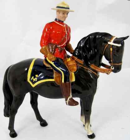 Appraisal: Beswick Canadian Mountie on Dark Brown Horse