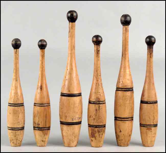 Appraisal: SIX TURNED WOOD INDIAN CLUBS Tallest '' Condition No Specific