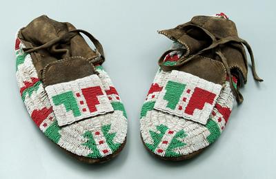 Appraisal: Pair beaded moccasins sinew and thread sewn red and green