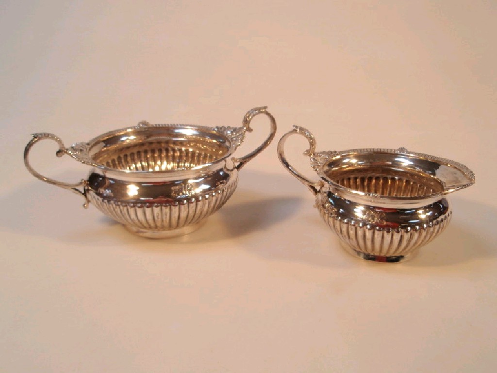 Appraisal: A Victorian Walker and Hall silver sugar bowl and milk