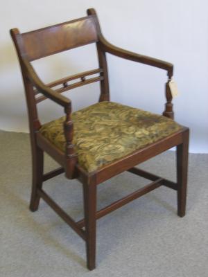 Appraisal: A GEORGE III MAHOGANY ELBOW CHAIR c the reeded uprights