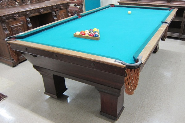 Appraisal: ANTIQUE BRUNSWICK OAK POOL TABLE The Brunswick-Balke-Collender Co Wellington model