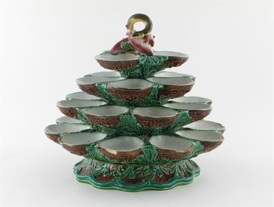 Appraisal: A Minton Majolica revolving oyster stand the four tiers of