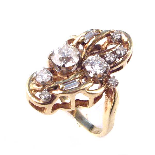 Appraisal: A diamond and gold free form ring some chipping evident