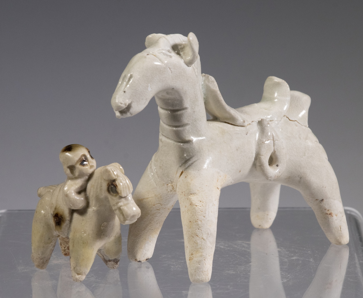 Appraisal: MINIATURE SONG QINBAI FIGURES OF HORSES The larger in pale