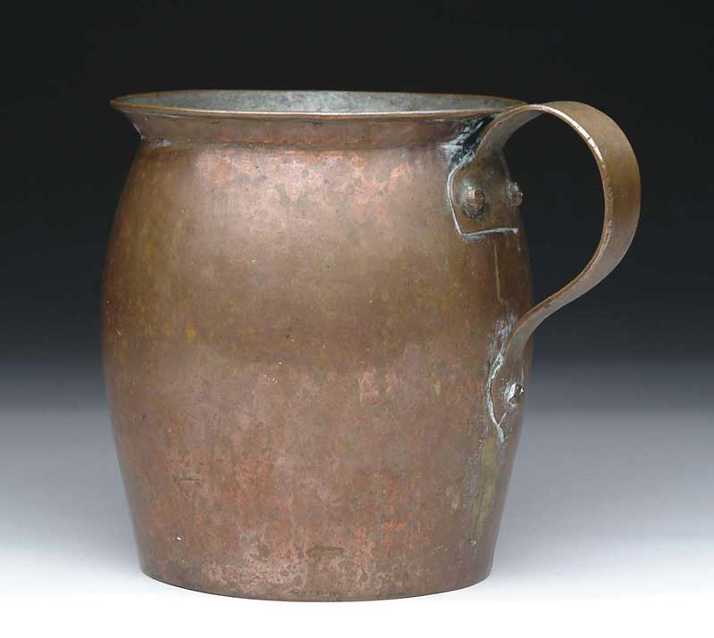 Appraisal: COPPER HANDLED PITCHER Round rim with riveted handle on ovoid