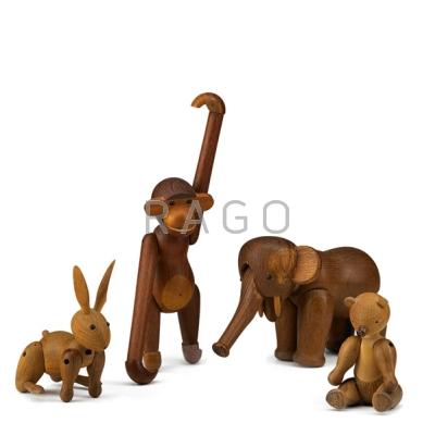 Appraisal: KAY BOJESEN Four articulated teak animals elephant bear rabbit and