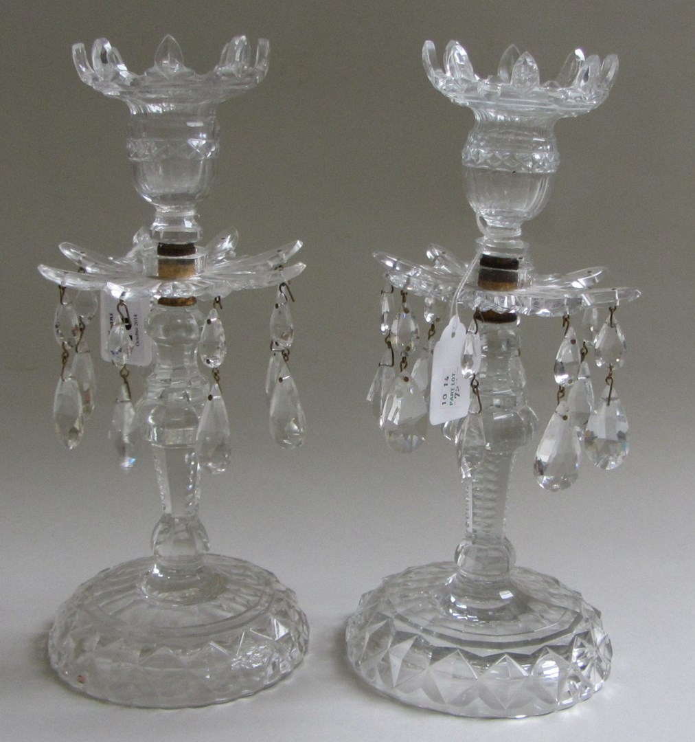 Appraisal: A pair of cut glass lustre candlesticks C possibly Anglo-Irish