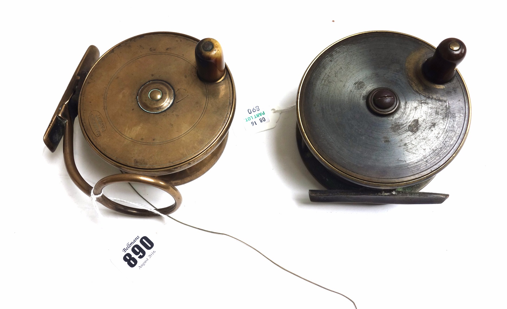 Appraisal: A Malloch patent inch brass side casting reel and a