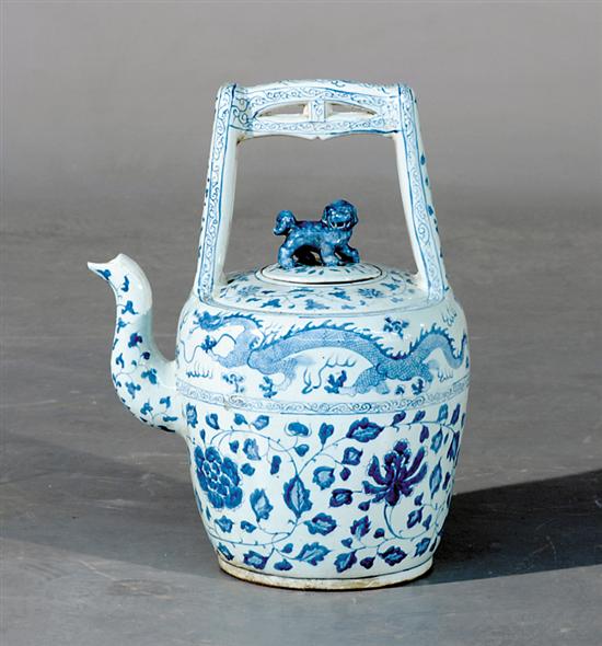 Appraisal: Chinese Export style blue-and-white teapot standing handle over pot decorated