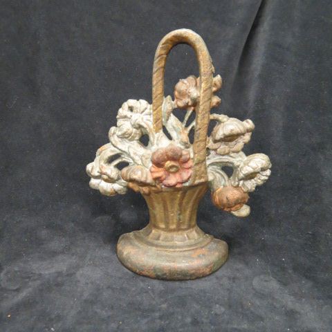 Appraisal: Cast Iron Figural Doorstop Basket of Flowers tall