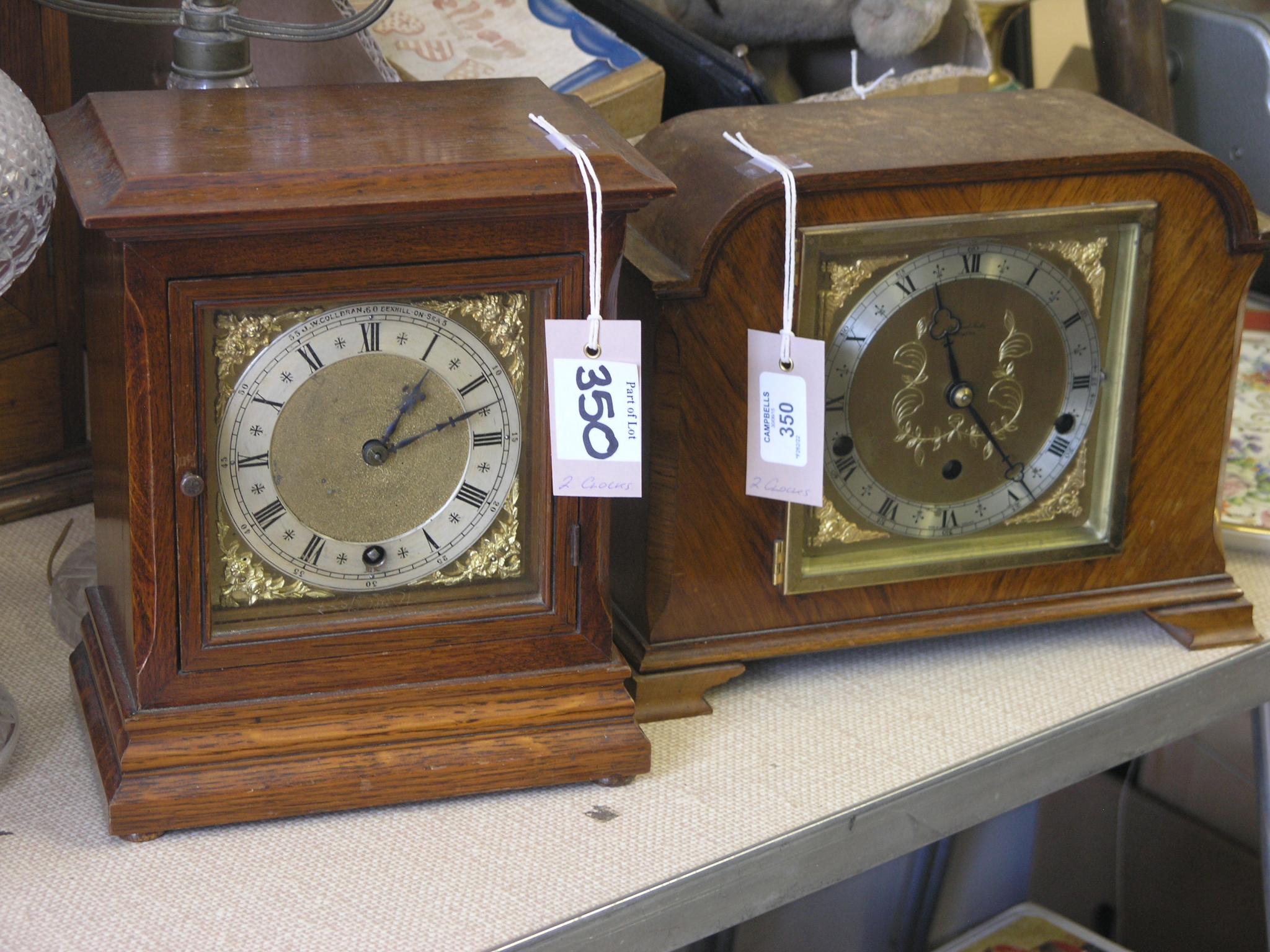 Appraisal: An oak mantel clock with square brass dial German timepiece