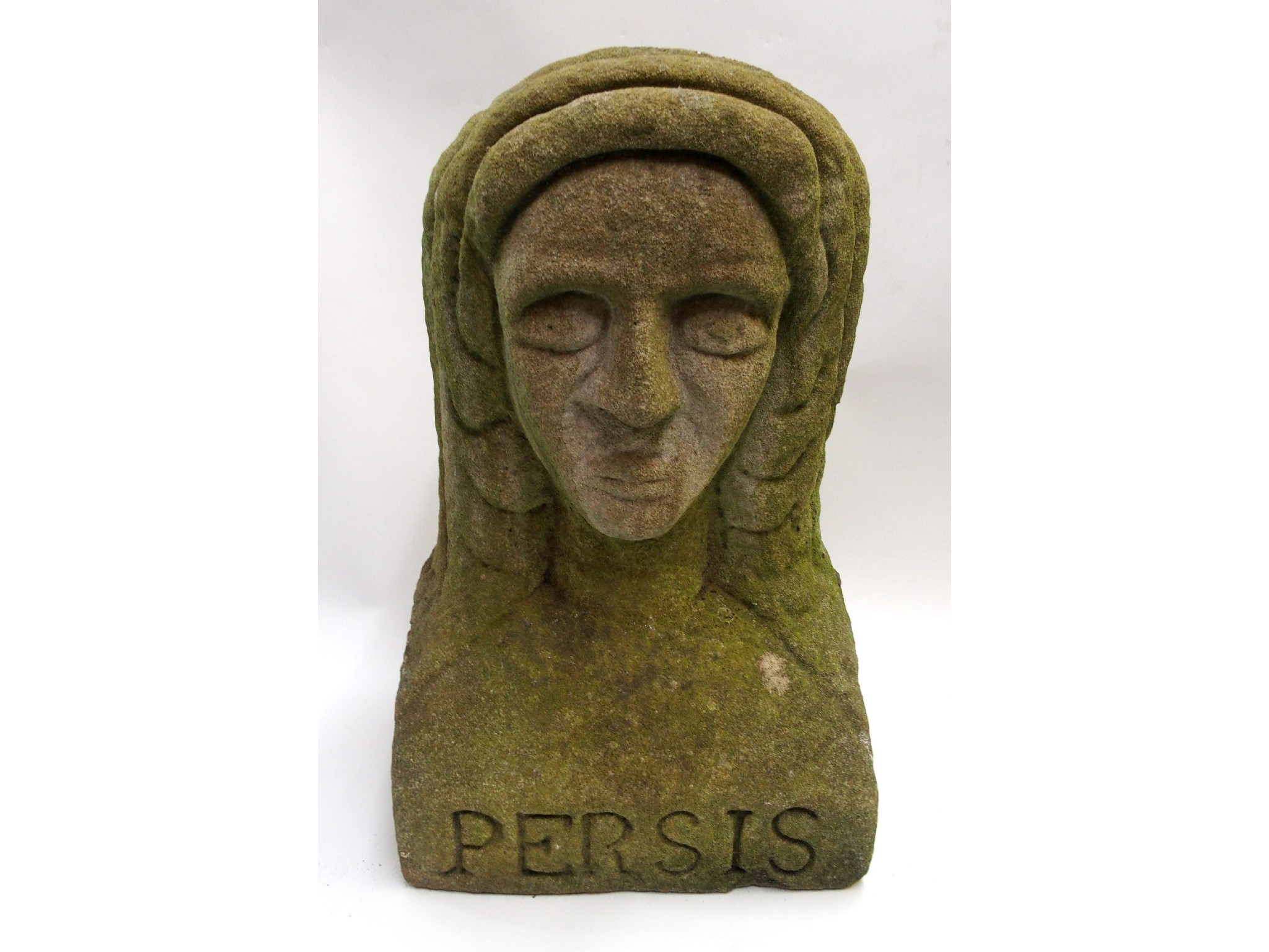 Appraisal: Persisa carved sandstone head of a Persian woman inscribed on