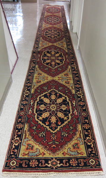 Appraisal: HAND KNOTTED ORIENTAL LONG RUG Indo-Persian ' x '