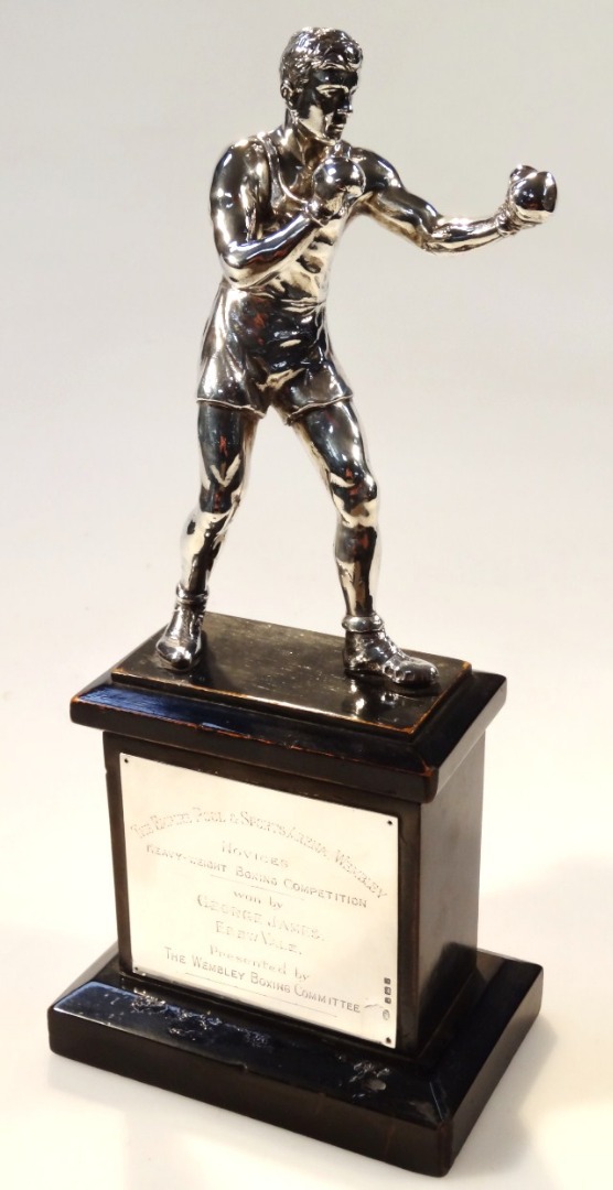 Appraisal: A silver plated and ebonised boxing trophy won by George