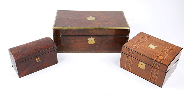 Appraisal: A VICTORIAN BURR WALNUT AND BRASS BOUND TABLE DESK a