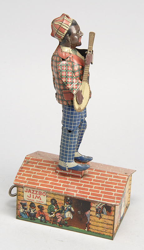 Appraisal: TIN LITHOGRAPHED JAZZBO JIM THE DANCER ON THE ROOF TOY