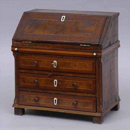 Appraisal: CONTINENTAL NEOCLASSICAL INLAID WALNUT MINIATURE SLANT-FRONT DESK The flap opening