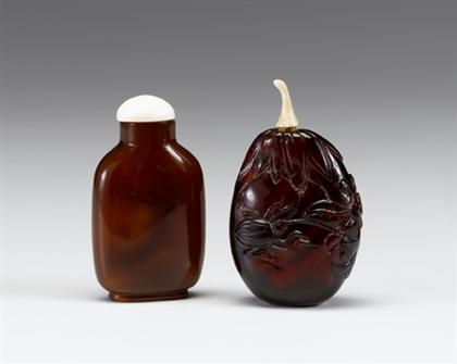 Appraisal: Rare Chinese carved amber snuff bottle and another snuff bottle