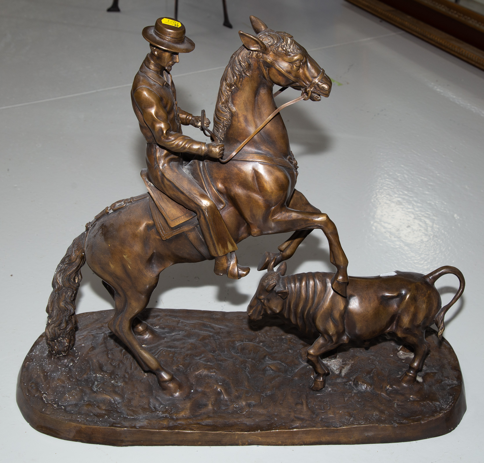 Appraisal: PATINATED BRONZE FIGURAL GROUP Depicting a South American gaucho and