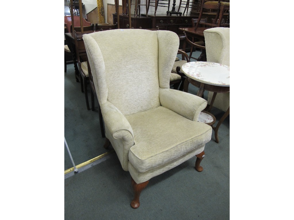 Appraisal: Pair of upholstered wing armchairs