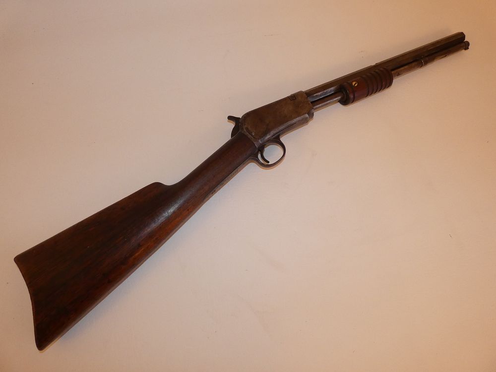 Appraisal: WINCHESTER RIFLE Antique Winchester pump action octagonal short barrel caliber