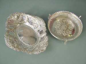 Appraisal: A silver lobed oval dish with pierced panels shell and