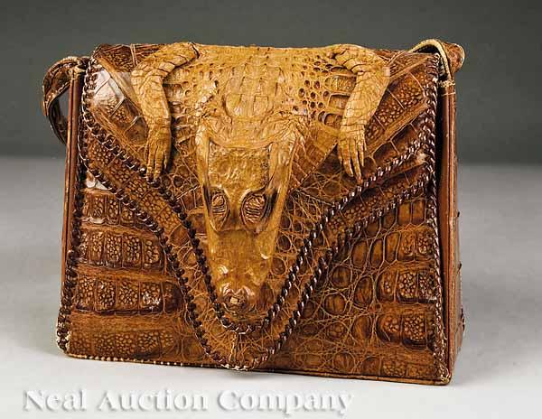 Appraisal: A Vintage Brown Alligator and Leather Shoulder Bag having an